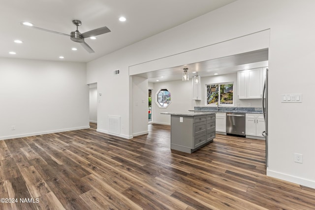 1024 E Hillcrest Dr, Flagstaff, AZ 86004 - kitchen with stainless steel dishwasher, gray cabinetry, dark wood-style floors, ceiling fan, and recessed lighting