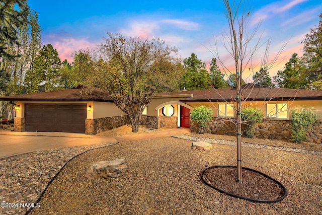 view of front of home with a garage