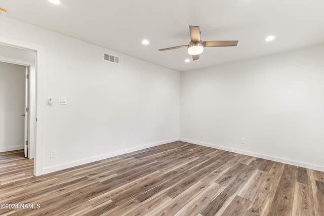 1024 E Hillcrest Dr, Flagstaff, AZ 86004 - spare room with a ceiling fan, recessed lighting, wood finished floors, and baseboards