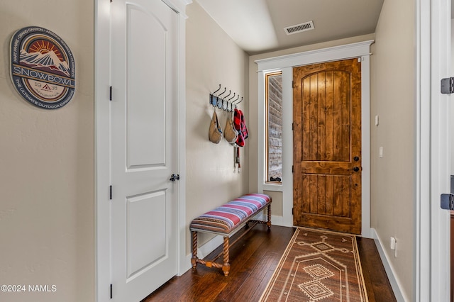 entrance foyer featuring dark hardwood / wood-style flooring