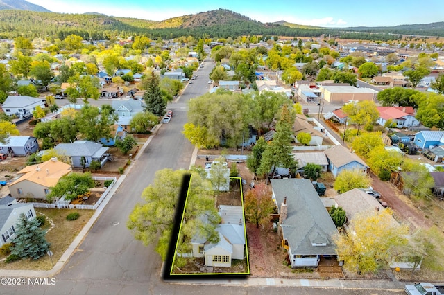 drone / aerial view featuring a mountain view