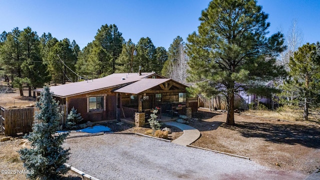 view of front of home with fence