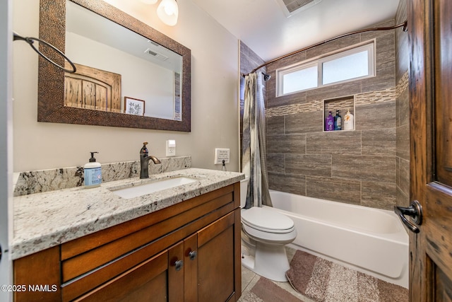 bathroom featuring tile patterned flooring, toilet, visible vents, vanity, and shower / bathtub combination with curtain