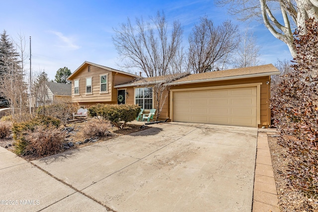 tri-level home featuring a garage