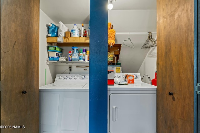 laundry area featuring laundry area and separate washer and dryer