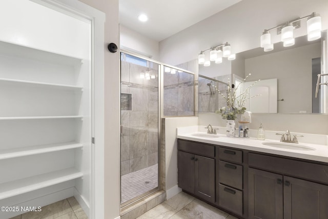 2385 W Mission Timber Cir, Flagstaff, AZ 86001 - bathroom featuring a stall shower, double vanity, and tile patterned floors