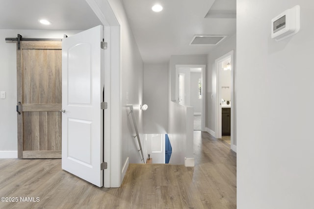2385 W Mission Timber Cir, Flagstaff, AZ 86001 - corridor featuring an upstairs landing, wood finished floors, baseboards, and recessed lighting