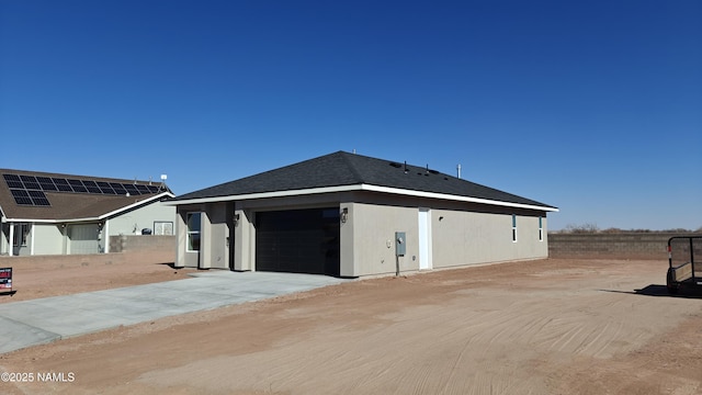 exterior space with a garage