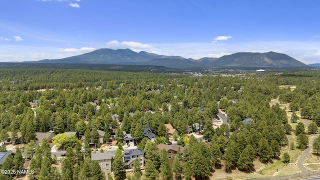 1248 W Lil Ben Trl, Flagstaff, AZ 86001 - aerial view of a heavily wooded area and a mountainous background