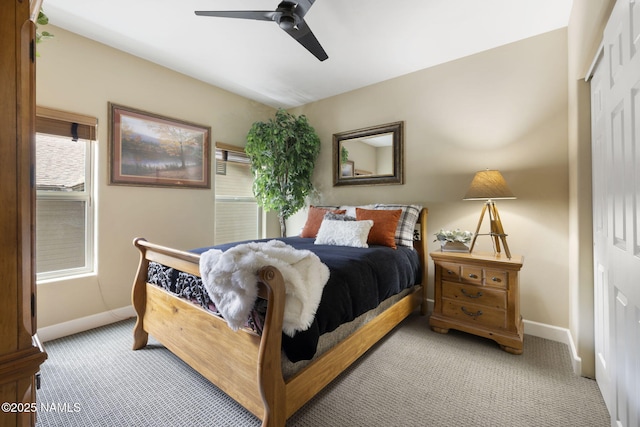 1248 W Lil Ben Trl, Flagstaff, AZ 86001 - bedroom with light carpet, a closet, baseboards, and ceiling fan