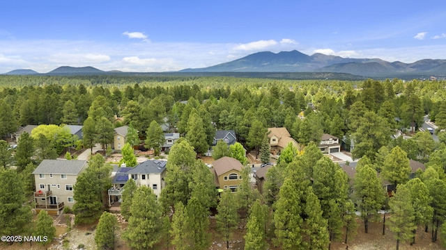 1248 W Lil Ben Trl, Flagstaff, AZ 86001 - aerial view of residential area featuring mountains and a heavily wooded area