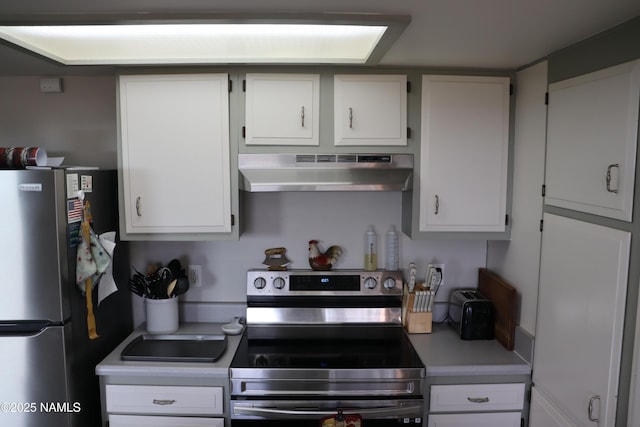 kitchen featuring white cabinets and stainless steel appliances