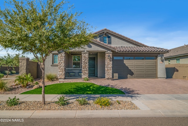 view of front of home with a garage