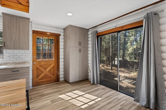 doorway featuring light hardwood / wood-style floors