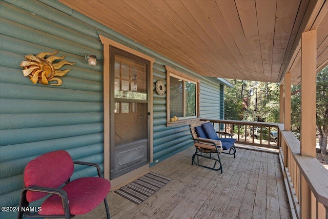 wooden deck featuring a porch