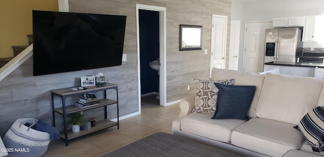 living area featuring light tile patterned floors