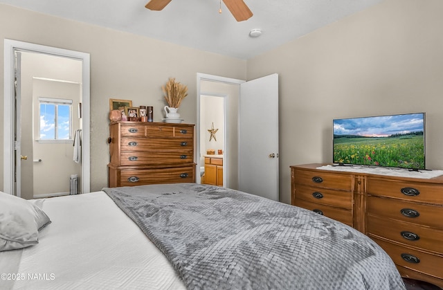 2197 E Arroyo Seco Dr, Flagstaff, AZ 86004 - bedroom with radiator, ceiling fan, and ensuite bathroom