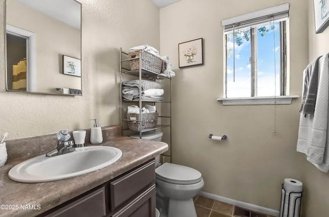 2197 E Arroyo Seco Dr, Flagstaff, AZ 86004 - full bath featuring vanity, toilet, and tile patterned floors