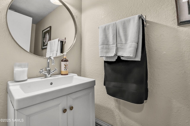 2197 E Arroyo Seco Dr, Flagstaff, AZ 86004 - bathroom with vanity and a textured wall