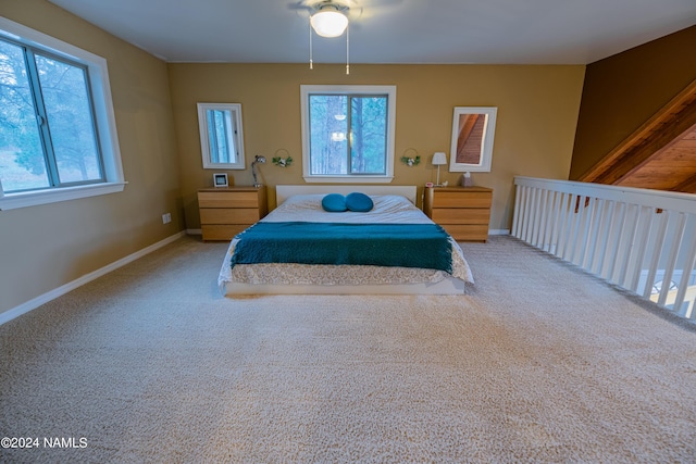 carpeted bedroom featuring ceiling fan