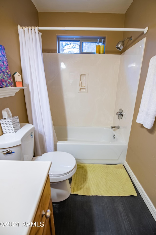 full bathroom with vanity, toilet, shower / tub combo, and hardwood / wood-style flooring