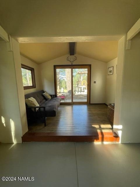 interior space with lofted ceiling with beams