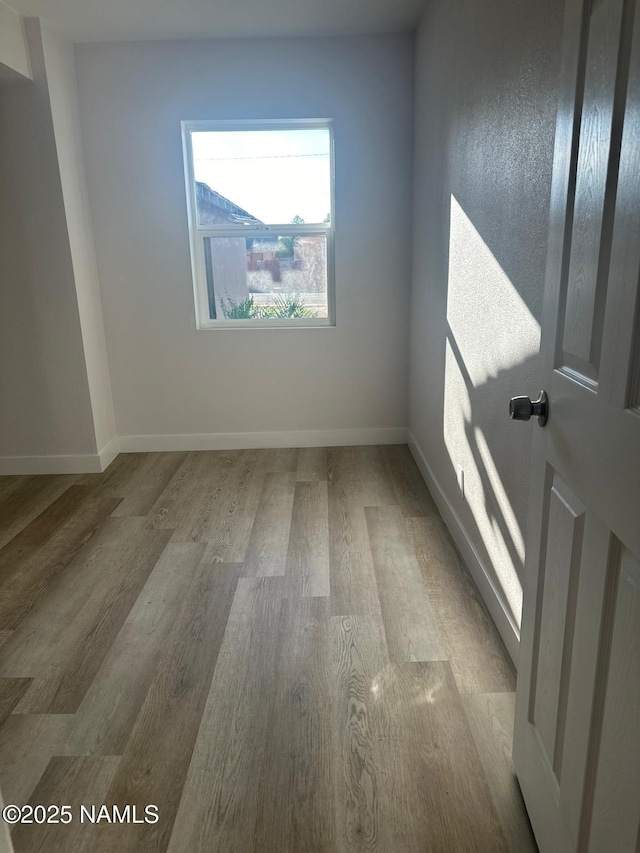 515 W Aspinwall St, Winslow, AZ 86047 - spare room with wood finished floors and baseboards