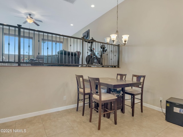 449 E Woodland Dr, Flagstaff, AZ 86001 - tiled dining room with visible vents, lofted ceiling, ceiling fan with notable chandelier, recessed lighting, and baseboards