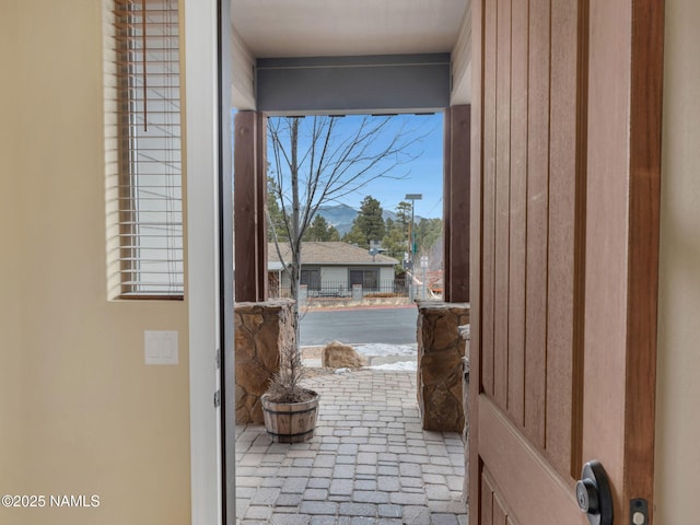 449 E Woodland Dr, Flagstaff, AZ 86001 - doorway to outside featuring brick floor