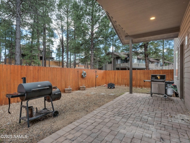 449 E Woodland Dr, Flagstaff, AZ 86001 - view of patio / terrace with grilling area and a fenced backyard