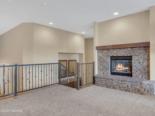449 E Woodland Dr, Flagstaff, AZ 86001 - unfurnished living room with carpet flooring, a fireplace, and recessed lighting