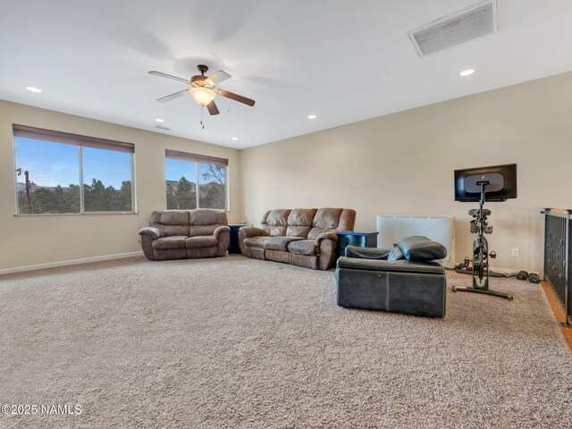 449 E Woodland Dr, Flagstaff, AZ 86001 - carpeted living room with recessed lighting, a ceiling fan, visible vents, and baseboards