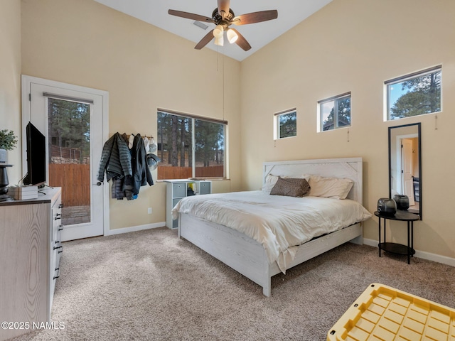 449 E Woodland Dr, Flagstaff, AZ 86001 - bedroom featuring baseboards, access to exterior, and carpet flooring