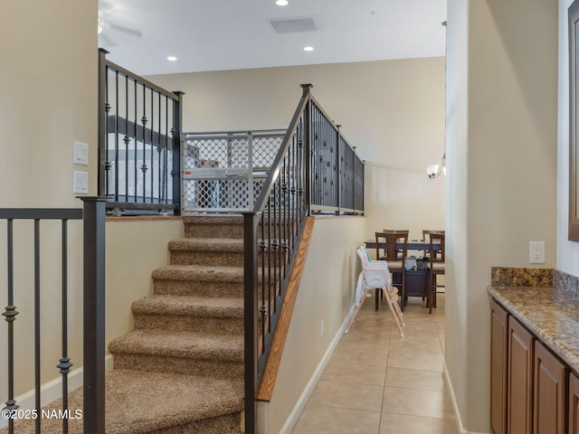 449 E Woodland Dr, Flagstaff, AZ 86001 - stairs featuring tile patterned floors, visible vents, recessed lighting, and baseboards