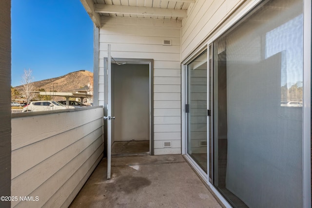 balcony featuring a mountain view