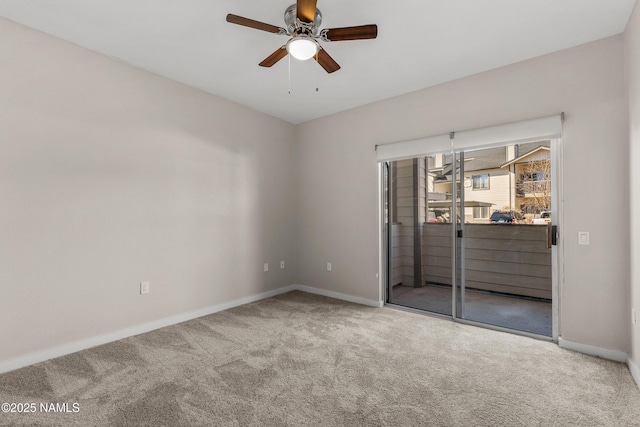 unfurnished room with carpet flooring and ceiling fan