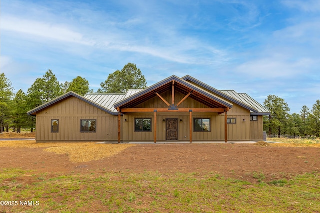 8441 N Fleming Dr, Flagstaff, AZ 86004 - view of front facade with a standing seam roof, metal roof, and board and batten siding