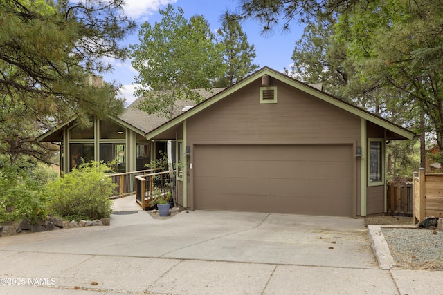 2169 E Skyline Dr, Flagstaff, AZ 86004 - view of front of property with driveway and a garage