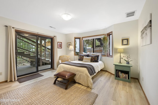 2169 E Skyline Dr, Flagstaff, AZ 86004 - bedroom featuring access to exterior and light wood-type flooring