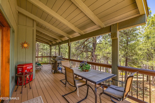 2201 N Rio De Flag Dr, Flagstaff, AZ 86004 - wooden terrace with outdoor dining area and a grill