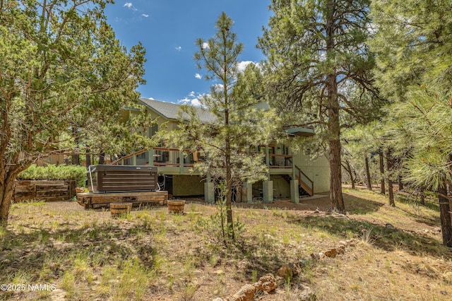 2201 N Rio De Flag Dr, Flagstaff, AZ 86004 - rear view of property featuring stairway and a wooden deck