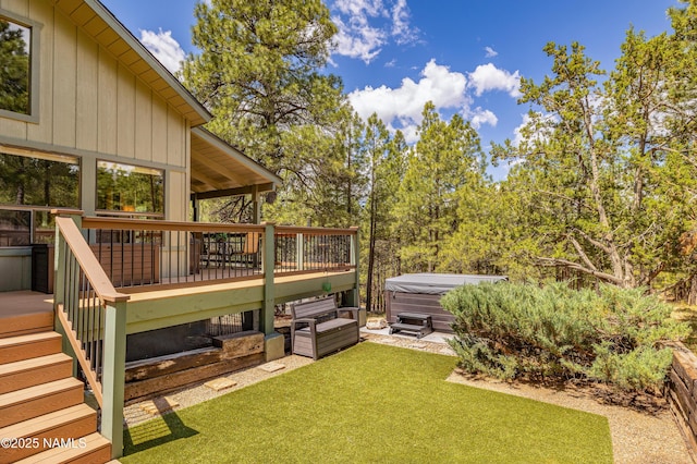 2201 N Rio De Flag Dr, Flagstaff, AZ 86004 - view of green lawn featuring a hot tub, a wooden deck, and stairway