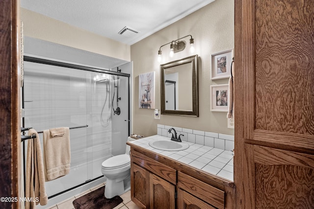 2201 N Rio De Flag Dr, Flagstaff, AZ 86004 - bathroom with vanity, a shower stall, and tile patterned flooring