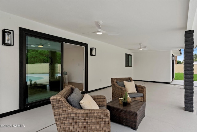 view of patio featuring a ceiling fan