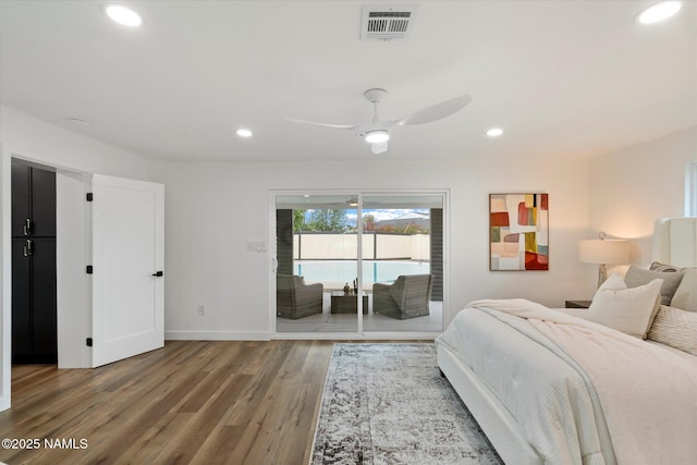 bedroom with access to outside, wood finished floors, recessed lighting, baseboards, and ceiling fan
