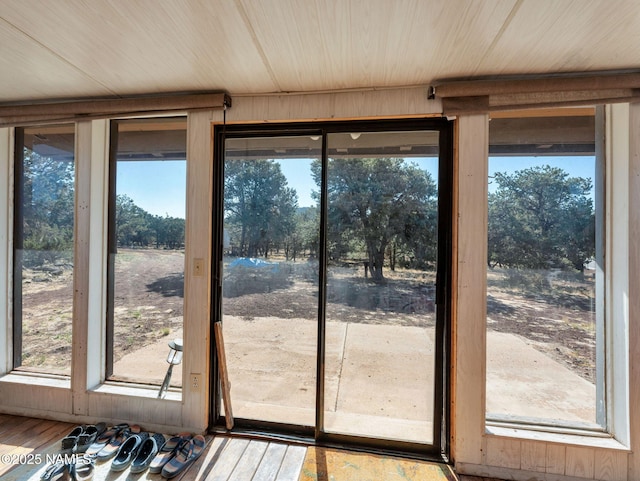 7284 N Buck Ridge Rd, Williams, AZ 86046 - entryway with healthy amount of natural light, hardwood / wood-style floors, and wood ceiling