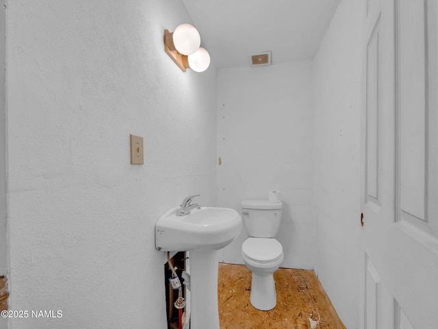 7284 N Buck Ridge Rd, Williams, AZ 86046 - bathroom featuring toilet and a sink