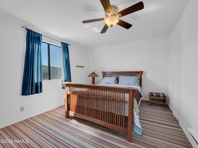 7284 N Buck Ridge Rd, Williams, AZ 86046 - carpeted bedroom with a ceiling fan