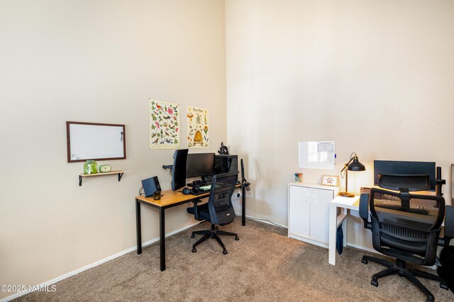 4343 E Soliere Ave Unit 2026, Flagstaff, AZ 86004 - carpeted office space featuring a towering ceiling and baseboards