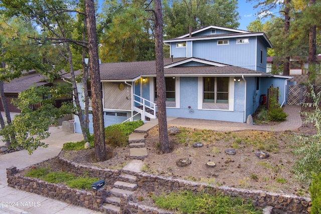 view of front of property featuring a garage